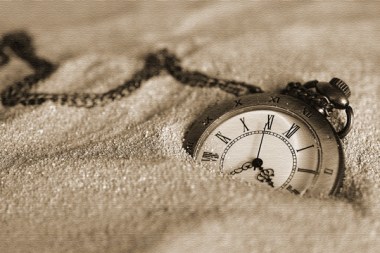 pocket watch in the sand